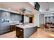Modern kitchen with island and stainless steel appliances at 140 E Rio Salado Pkwy # 111, Tempe, AZ 85281