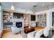 Cozy library with built-in bookshelves and fireplace at 140 E Rio Salado Pkwy # 111, Tempe, AZ 85281
