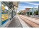 Modern light rail station with platform and signage at 140 E Rio Salado Pkwy # 111, Tempe, AZ 85281