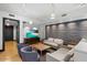 Comfortable lounge with sofas, chairs, and a large TV at 140 E Rio Salado Pkwy # 111, Tempe, AZ 85281