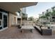 Outdoor patio with a sectional sofa and coffee table, perfect for relaxing at 140 E Rio Salado Pkwy # 111, Tempe, AZ 85281