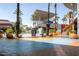Outdoor shopping center with palm trees and seating areas at 140 E Rio Salado Pkwy # 111, Tempe, AZ 85281