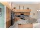 Spacious kitchen featuring granite countertops and stainless steel appliances at 14140 W Green Hollow Ter, Litchfield Park, AZ 85340