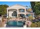 Luxury home with a private pool and boat dock on the lake at 1519 E Treasure Cove Dr, Gilbert, AZ 85234