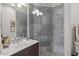 Spa-like bathroom with patterned tile shower at 1519 E Treasure Cove Dr, Gilbert, AZ 85234