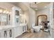 Spa-like bathroom with double vanities and a freestanding tub at 1519 E Treasure Cove Dr, Gilbert, AZ 85234