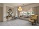 Spacious bedroom with bay window and seating area at 1519 E Treasure Cove Dr, Gilbert, AZ 85234