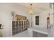 Craft room with ample storage and work surface at 1519 E Treasure Cove Dr, Gilbert, AZ 85234