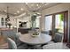 Bright dining area with a round table and chairs, adjacent to the kitchen at 1519 E Treasure Cove Dr, Gilbert, AZ 85234