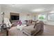Spacious game room with comfortable seating and large windows at 1519 E Treasure Cove Dr, Gilbert, AZ 85234