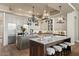Open concept kitchen boasts a large island and stainless steel appliances at 1519 E Treasure Cove Dr, Gilbert, AZ 85234