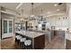 Spacious kitchen featuring a large island, custom cabinetry, and high-end finishes at 1519 E Treasure Cove Dr, Gilbert, AZ 85234
