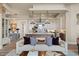 Modern kitchen with white cabinetry, large island, and pendant lighting at 1519 E Treasure Cove Dr, Gilbert, AZ 85234