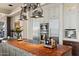 Island kitchen with a butcher block countertop and high-end stainless steel appliances at 1519 E Treasure Cove Dr, Gilbert, AZ 85234