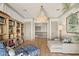 Bright library with built-in shelving and comfortable seating at 1519 E Treasure Cove Dr, Gilbert, AZ 85234