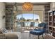 Relaxing living room with access to a balcony and lake views at 1519 E Treasure Cove Dr, Gilbert, AZ 85234