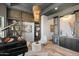Music room with built-in shelving, wet bar, and a grand piano at 1519 E Treasure Cove Dr, Gilbert, AZ 85234