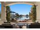 Relaxing patio overlooking a lake with seating and a beautiful view at 1519 E Treasure Cove Dr, Gilbert, AZ 85234