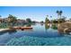 Luxury pool with lake access, offering serene waterfront views at 1519 E Treasure Cove Dr, Gilbert, AZ 85234