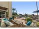 Waterfront patio with comfortable seating and stunning lake views at 1519 E Treasure Cove Dr, Gilbert, AZ 85234