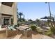 Waterfront patio with comfortable seating and stunning lake views at 1519 E Treasure Cove Dr, Gilbert, AZ 85234