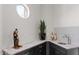 Stylish wet bar with granite countertop and modern sink at 1519 E Treasure Cove Dr, Gilbert, AZ 85234