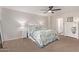 Cozy bedroom with a comfortable bed and white dresser at 15935 N 171St Ln, Surprise, AZ 85388