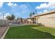 Backyard with swimming pool and artificial turf at 1637 N Bridalwreath St, Tempe, AZ 85288