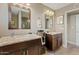 Double vanity bathroom with granite countertops at 1637 N Bridalwreath St, Tempe, AZ 85288