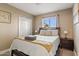 Bright bedroom with double bed and ample closet space at 1637 N Bridalwreath St, Tempe, AZ 85288