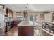 Modern kitchen with granite countertops and dark wood cabinets at 1637 N Bridalwreath St, Tempe, AZ 85288