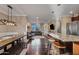 Open concept kitchen features granite countertops and breakfast bar at 1637 N Bridalwreath St, Tempe, AZ 85288