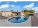 Relaxing kidney-shaped pool with lounge chairs at 1637 N Bridalwreath St, Tempe, AZ 85288