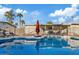 Stunning kidney-shaped pool, surrounded by patio at 1637 N Bridalwreath St, Tempe, AZ 85288