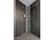 Large walk-in shower with mosaic tile detail at 1637 N Bridalwreath St, Tempe, AZ 85288