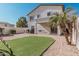 Artificial turf backyard with patio and grill at 16705 N 175Th Dr, Surprise, AZ 85388