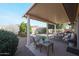 Covered patio with seating area, perfect for outdoor relaxation at 16916 W Eureka Springs Dr, Surprise, AZ 85387