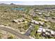 Aerial view of community with lake, golf course, and desert landscape at 17025 E La Montana Dr # 130, Fountain Hills, AZ 85268