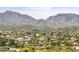 Aerial view of houses nestled in a mountain setting at 17025 E La Montana Dr # 130, Fountain Hills, AZ 85268