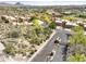 Aerial view of community entrance and surrounding landscape at 17025 E La Montana Dr # 130, Fountain Hills, AZ 85268