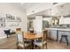 Charming dining area with a round wooden table and four chairs at 17025 E La Montana Dr # 130, Fountain Hills, AZ 85268