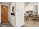 Inviting entryway with hardwood floors and a view into the dining area at 17025 E La Montana Dr # 130, Fountain Hills, AZ 85268