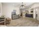 Spacious living room with hardwood floors and a cozy seating area at 17025 E La Montana Dr # 130, Fountain Hills, AZ 85268