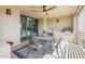 Outdoor patio with built-in grill, seating area, and lovely desert views at 17025 E La Montana Dr # 130, Fountain Hills, AZ 85268