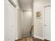 Simple staircase with wooden railing and neutral walls at 17025 E La Montana Dr # 130, Fountain Hills, AZ 85268
