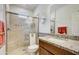 Bathroom boasts granite countertop, walk-in shower, and tile at 17535 E Silver Sage Ln, Rio Verde, AZ 85263