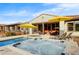 Enjoy the bubbly hot tub with lounge chairs nearby at 17535 E Silver Sage Ln, Rio Verde, AZ 85263