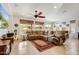 Spacious living room with a large sectional sofa and views to backyard at 17535 E Silver Sage Ln, Rio Verde, AZ 85263