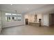 Open-concept kitchen and living area with modern appliances and ample counter space at 1932 W Rowel Rd, Phoenix, AZ 85085
