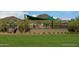 Community playground with shaded play area and slide at 1932 W Rowel Rd, Phoenix, AZ 85085